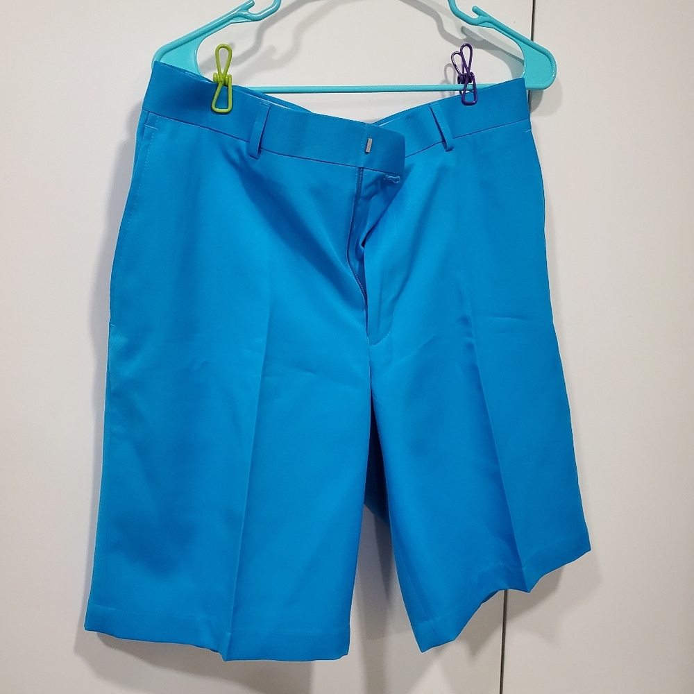 Men's golf shorts, worn once, size 34.